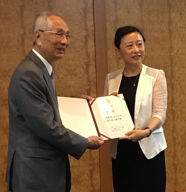 Founder of Eternal Materials receives honorary trustee from Beijing Tsinghua University